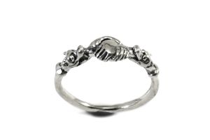 Ring with hands and dragon heads, viking ring
